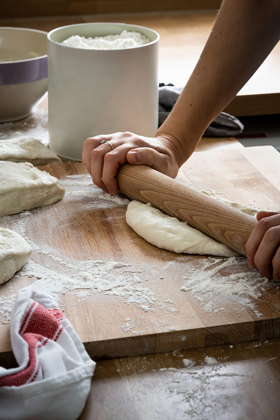 Baker Kneading Dough Kitchen Closeup
